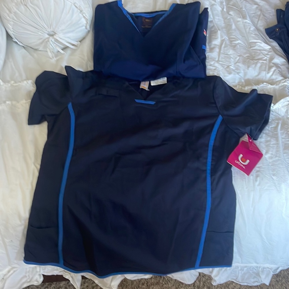 2 urbane + 1 NRG  MEDIUM Tops. 1 grey anatomy and zenergy medium scrub pants.